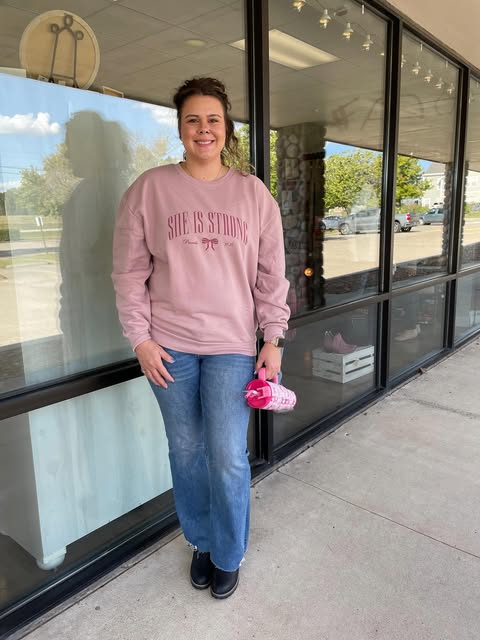 "She Is Strong" Bow Sweatshirt