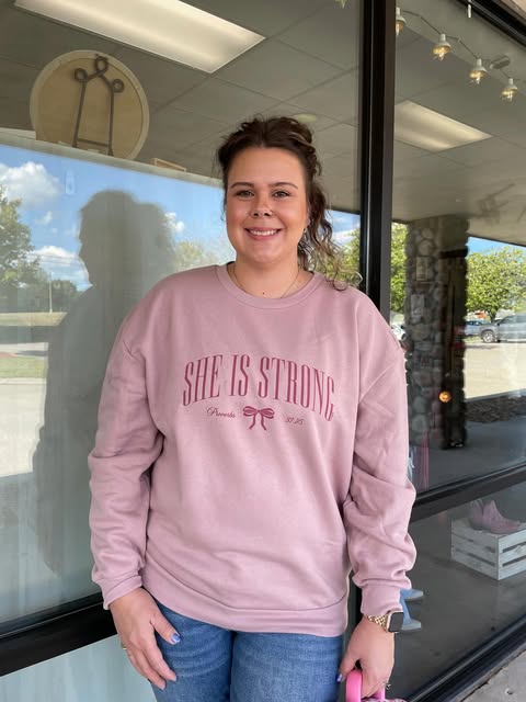 "She Is Strong" Bow Sweatshirt